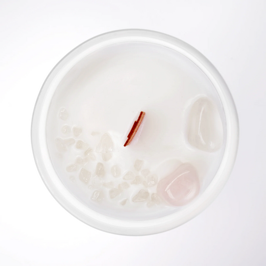 INNCALM Cashmere soy wax scented candle, offering a rich cashmere scent and a gentle, flickering glow when lit.