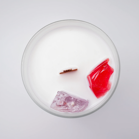 INNCALM soy wax scented candle featuring a smooth, glossy surface and a wooden wick, releasing a cozy, festive aroma.