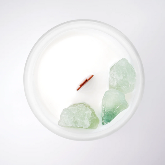 luxury scented candle with a wooden wick and a clean citrus scent, blending lime, basil, and mandarin for a revitalizing aroma