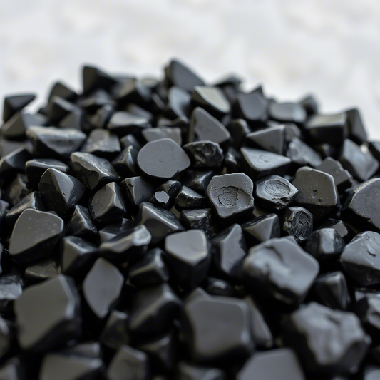 Black Obsidian used in Whisky & Cedar INNCALM Scented Candle promotes strength, balance and refined calm.