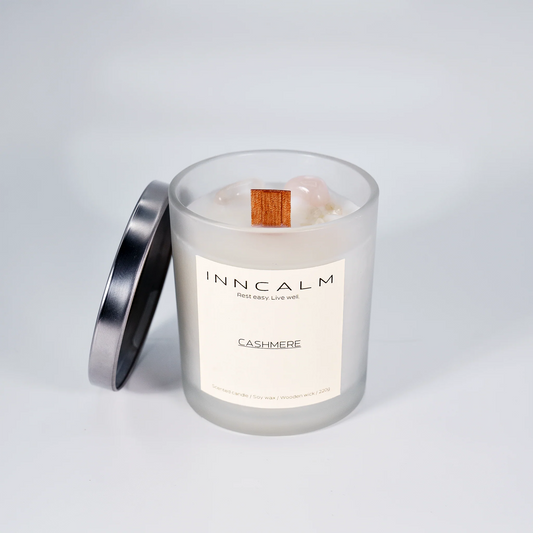 INNCALM candle with an elegant fragrance blend of musk, vanilla, and soft florals, perfect for a luxurious ambiance.