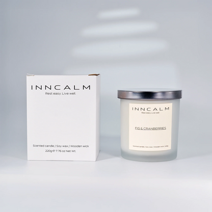 Premium packaging for the INNCALM Fig & Cranberries scented candle, a luxurious home fragrance gift for any occasion.