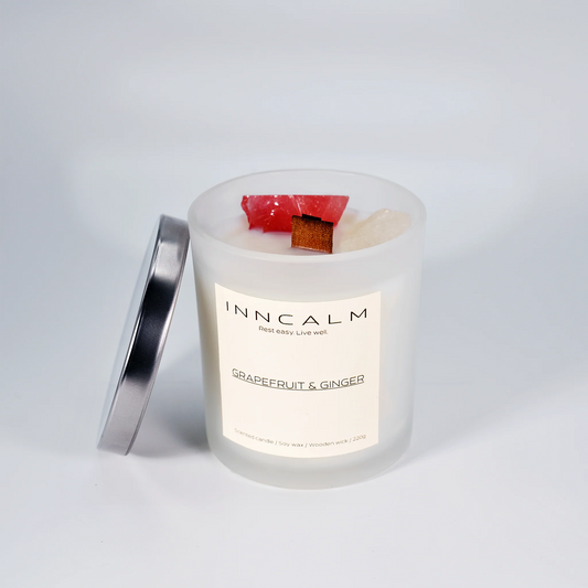 Luxury Grapefruit & Ginger scented candle with a protective lid, keeping the vibrant citrus and spicy ginger fragrance fresh