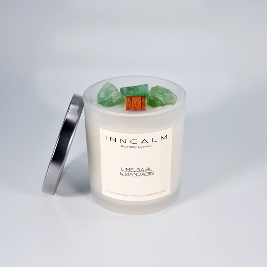 INNCALM Lime, Basil & Mandarin scented candle with a sleek, airtight lid to preserve its vibrant, zesty fragrance.