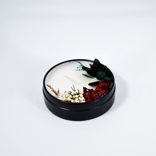 Mood Activation scented candle in a tin – top view of the natural soy wax candle with floral decorations for a vibrant and refreshing ambiance.