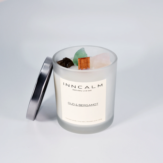 INNCALM luxurious Oud & Bergamot scented candle, balancing deep oud with bright bergamot for a refined scent experience.