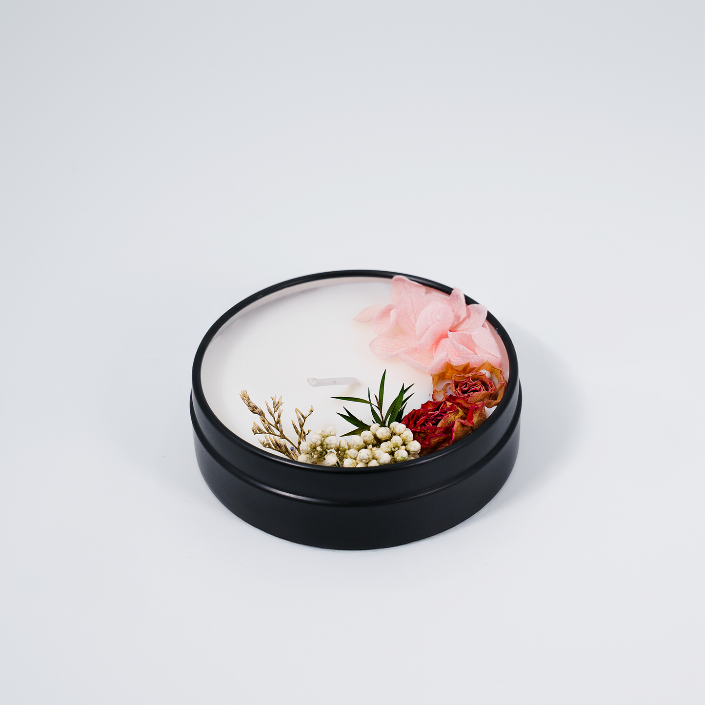 Close-up of Spirit Refresh scented candle showcasing intricate floral decor for a calming and luxurious ambiance.