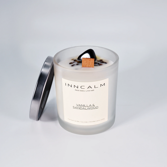 INNCALM Luxury scented candle with a protective lid, preserving the warm and inviting scent of vanilla and sandalwood.